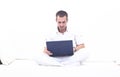 Man working on laptop, sitting on the couch Royalty Free Stock Photo