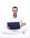 Man working on laptop, sitting on the couch Royalty Free Stock Photo