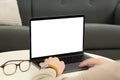 Man working with laptop at white table indoors, closeup Royalty Free Stock Photo