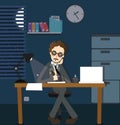 Man working late night deadline in office alone dark overtime sitting desk with lamp Royalty Free Stock Photo