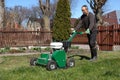 Man working with Lawn Aerator