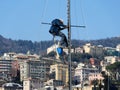 Man working on a mast of a ship Royalty Free Stock Photo