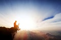 Man working on notebook on top of the mountains. Internet freedom Royalty Free Stock Photo