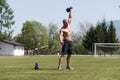 Man Exercising With Kettle Bell Outdoors Royalty Free Stock Photo