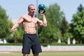 Man Exercising With Kettle Bell Outdoors Royalty Free Stock Photo