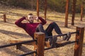 Man doing crunches while working out outdoors Royalty Free Stock Photo