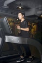 Man working out on a treadmill at gym Royalty Free Stock Photo
