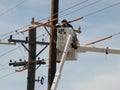 Man working on the power lines