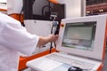 Man working at programmable machine Royalty Free Stock Photo