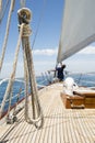 Man working on prow of yacht Royalty Free Stock Photo