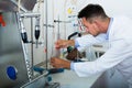 Man working on quality of products in lab