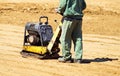 Man is working at the road construction Royalty Free Stock Photo