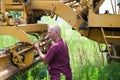 Man working on road equipment Royalty Free Stock Photo