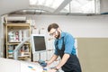 Man working with spectrometer at the manufacturing Royalty Free Stock Photo