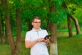 Man working with tablet computer outdoors Royalty Free Stock Photo