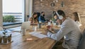 Man working with tablet and headphones in an office Royalty Free Stock Photo