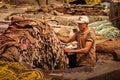 Man working at a tannery. Marrakesh. Morocco