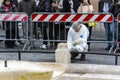 Man working to restore the damage done by Hooligan after the clash in spanish steps