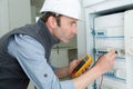 man working using multimeter electrician concept Royalty Free Stock Photo