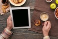 Man working with using a tablet computer in the morning Royalty Free Stock Photo