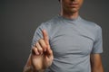 Man working with virtual interface, push the index finger button.