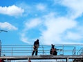 Man Working on the Working at height on construction Royalty Free Stock Photo