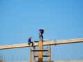 Man Working on the Working at height on construction Royalty Free Stock Photo