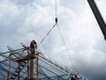 Man Working on the Working at height on construction Royalty Free Stock Photo