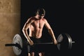 Man workout in gym doing exercises with barbell Royalty Free Stock Photo