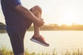 Man workout and wellness concept : Asian runner warm up his body Royalty Free Stock Photo