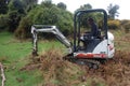 Man works with digger