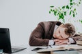 A man works in the Office at the computer business clerk