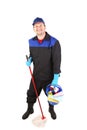 Man in workwear with bucket and mop. Royalty Free Stock Photo