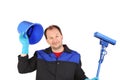Man in workwear with bucket and mop. Royalty Free Stock Photo
