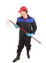 Man in workwear with mop. Royalty Free Stock Photo
