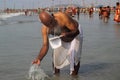 A man is worshiping the Ganga.