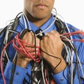 Man wrapped in cables. Royalty Free Stock Photo