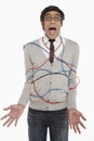 Man wrapped in network cables Royalty Free Stock Photo