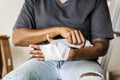 A man wrapping his hand with a bandage Royalty Free Stock Photo