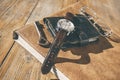 Man wristwatch, calendar, key and glasses on a old table. Royalty Free Stock Photo