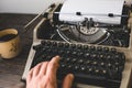 Man Writer Typing On A Old Typewriter. Journalism Report Concept Royalty Free Stock Photo