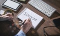 Man writes text Success in notepad Royalty Free Stock Photo