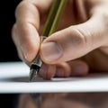 Man writing with a fountain pen Royalty Free Stock Photo