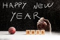 Man writing a 2015 Happy New Year greeting Royalty Free Stock Photo