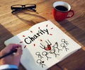 Man Writing and Planning Charity Concepts Royalty Free Stock Photo