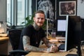 Man writing tattoo job background learning art artist workplace digital business laptop working