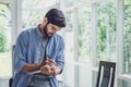 A man looking and thinking at note book while working at home office Royalty Free Stock Photo