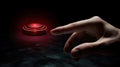 a man& x27;s hand hovering above a prominent red button set against a dark, suspenseful background. The image conveys the