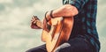 Man& x27;s hands playing acoustic guitar, close up. Acoustic guitars playing. Music concept Royalty Free Stock Photo