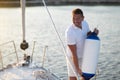 Man on a yacht getting ready for traveling